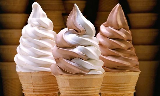 Soft serve ice cream cones in vanilla, chocolate and swirl